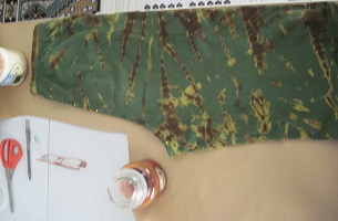 outlining a pair of pants to make a pattern